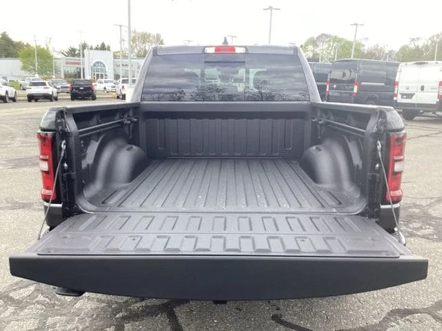 New 2026 Granite Crystal Metallic Clearcoat Ram EXPRESS CREW CAB 4X4 5