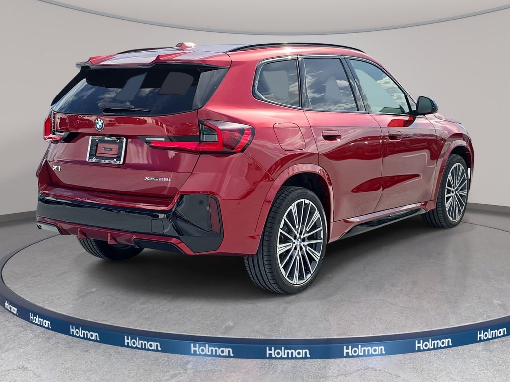 New 2026 Vegas Red Metallic BMW xDrive28i image 4