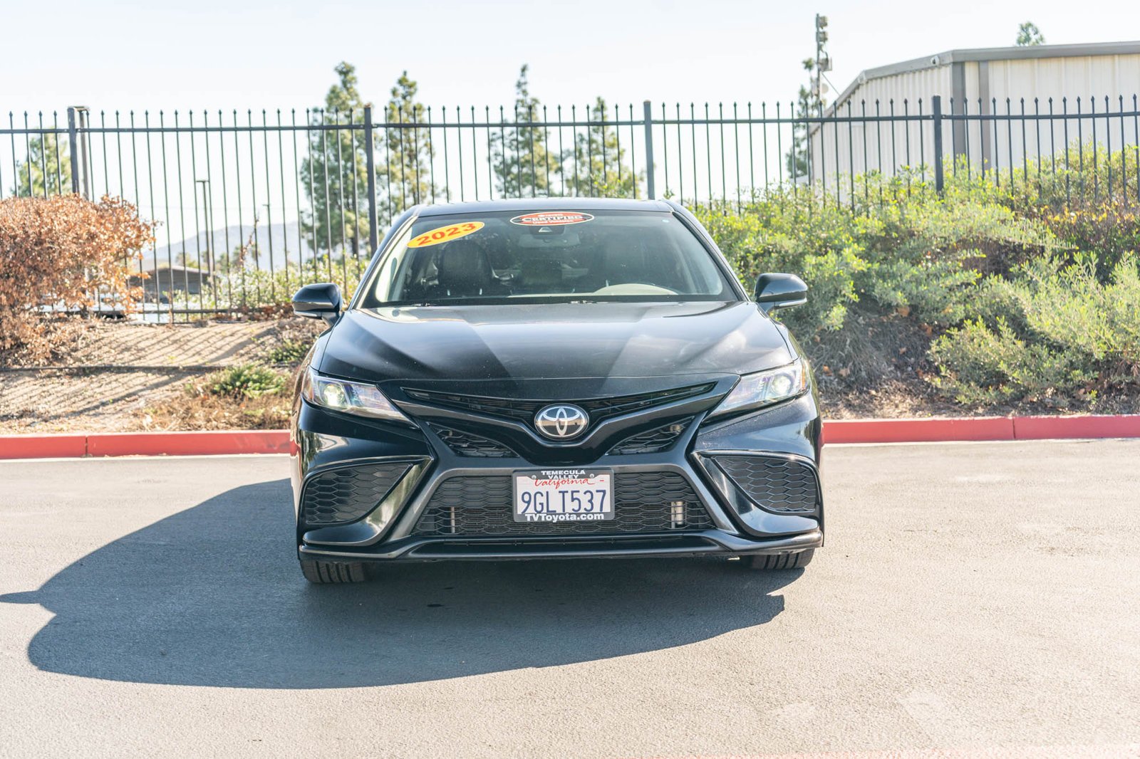 Certified Used 2023 Midnight Black Metallic Toyota SE Nightshade image 2