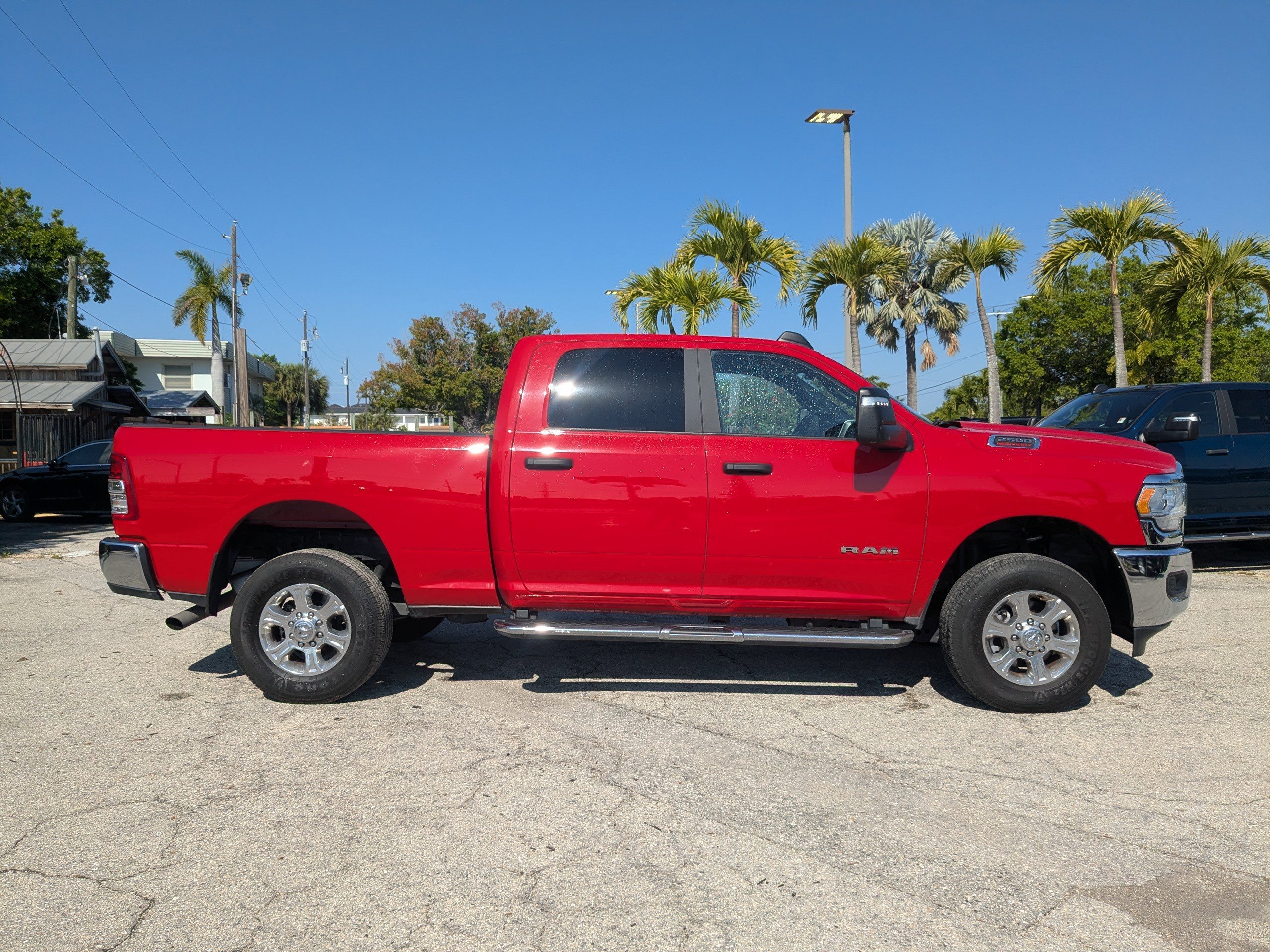 Used 2024 Flame Red Clearcoat Ram Big Horn image 3