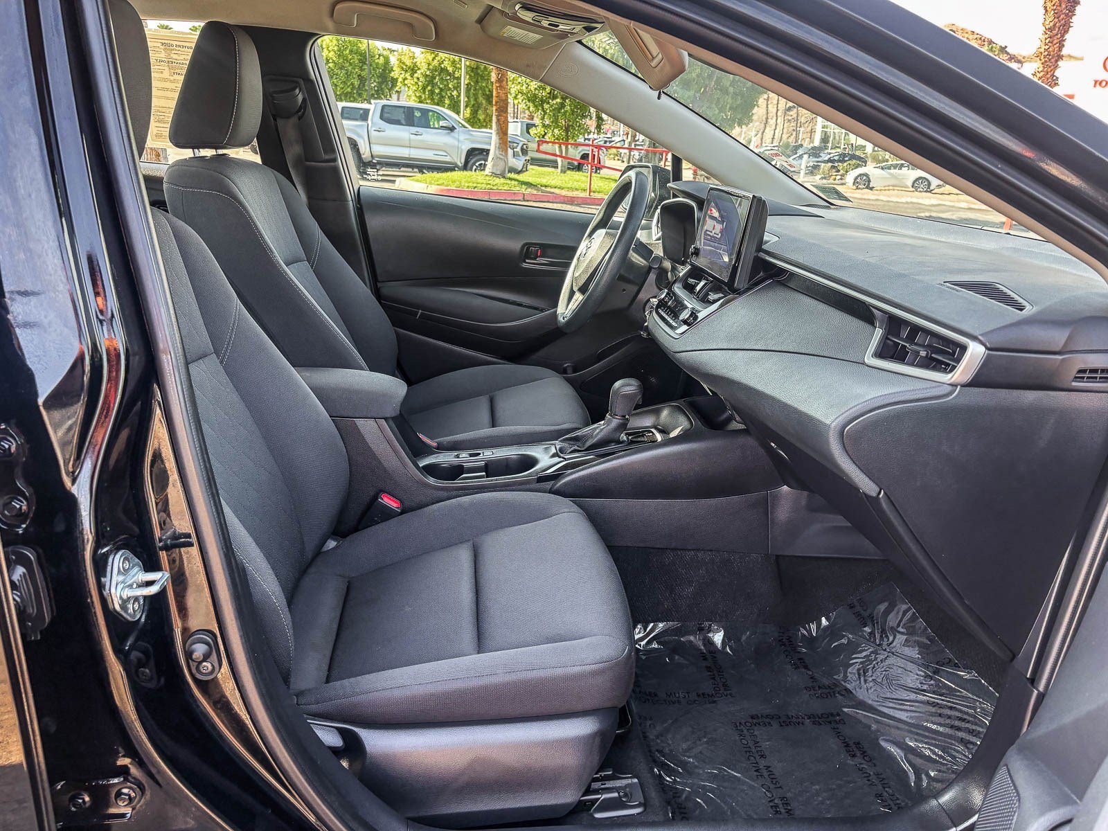 Certified Used 2024 Midnight Black Metallic Toyota LE image 18