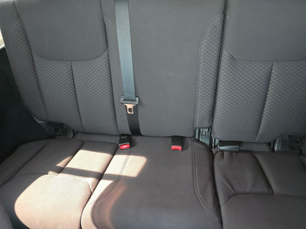 Used 2013 Black Jeep Unlimited Sport image 19
