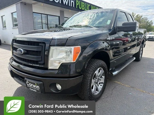 Used 2014 Black Ford STX image 1