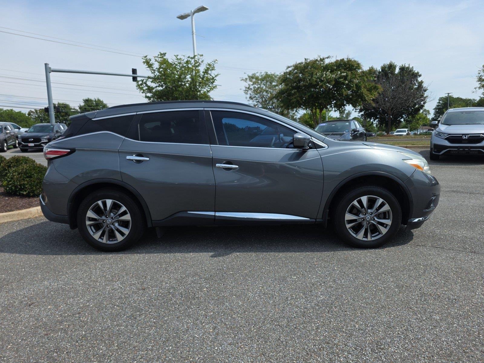 Used 2016 Gun Metallic Nissan SV image 20