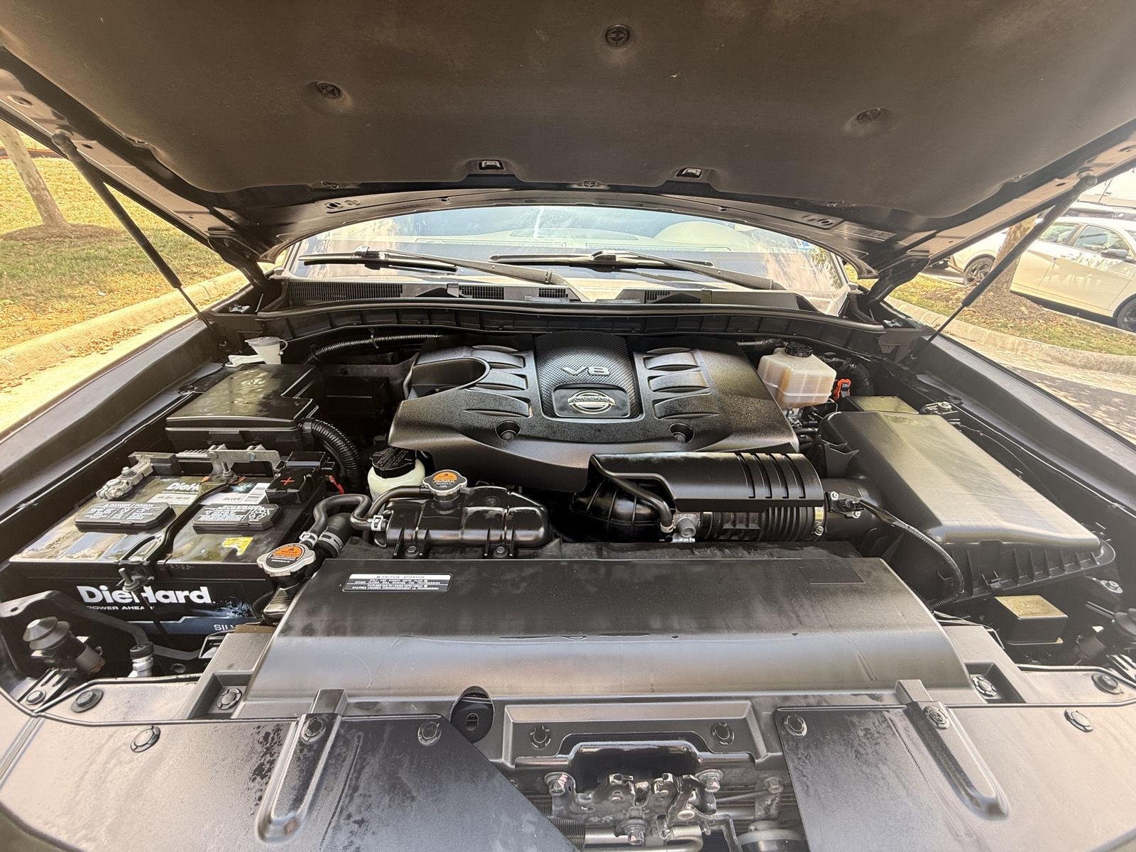 Used 2018 Super Black Nissan Platinum image 12