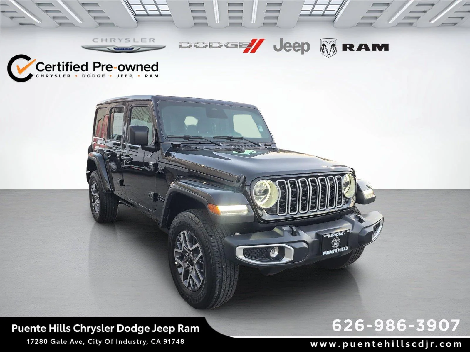 Certified Used 2026 Black Clearcoat Jeep Sahara image 1