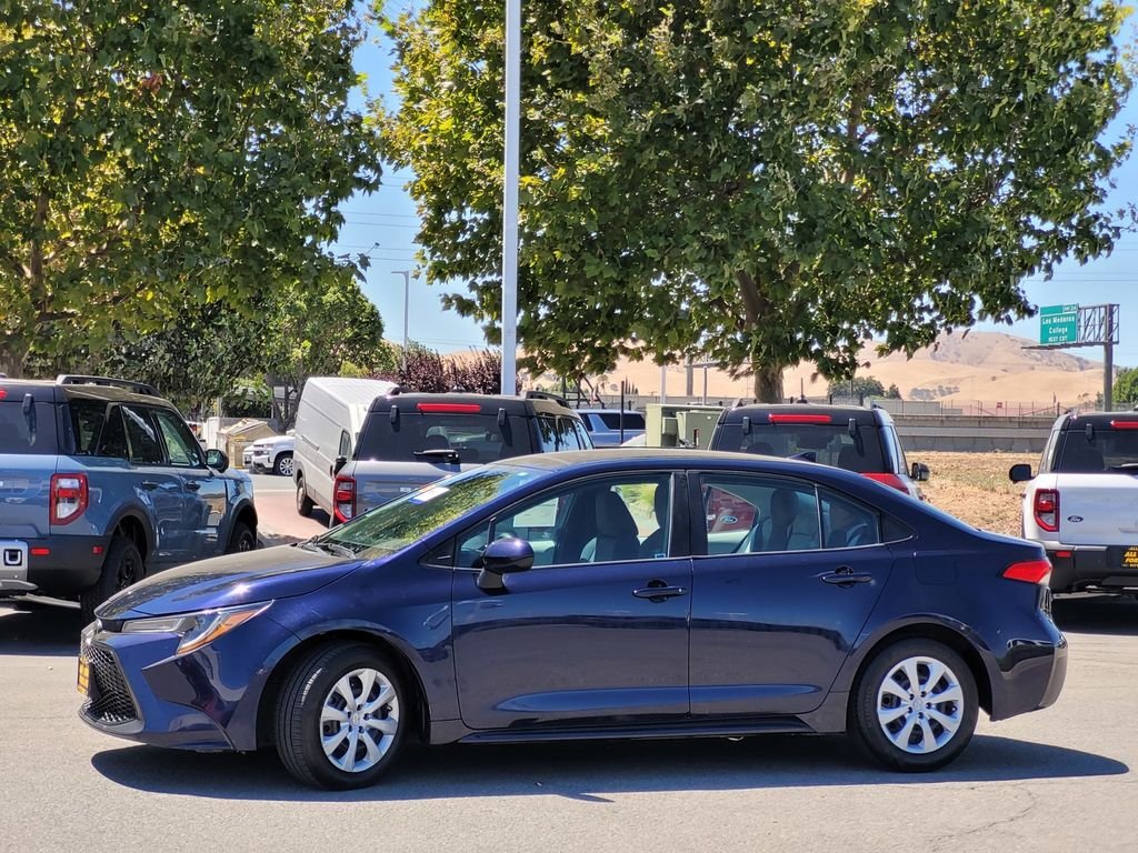 Used 2021 Blue Toyota LE image 7