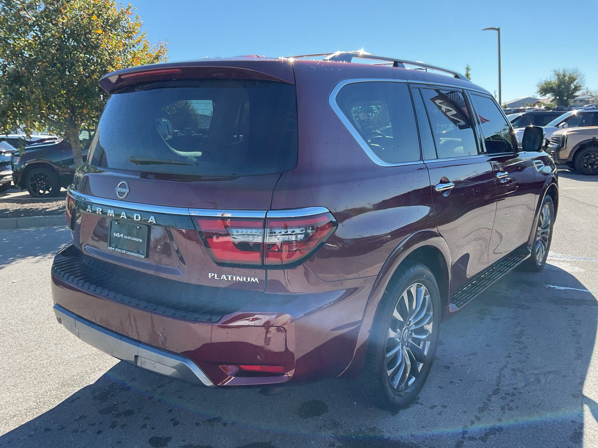 Used 2023 Coulis Red Pearl Nissan Platinum image 9