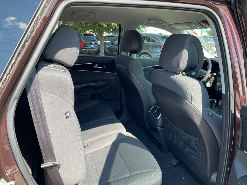Used 2016 Dark Cherry Kia LX image 12