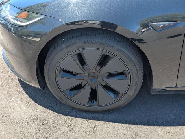 Used 2025 Solid Black Tesla Long Range image 11