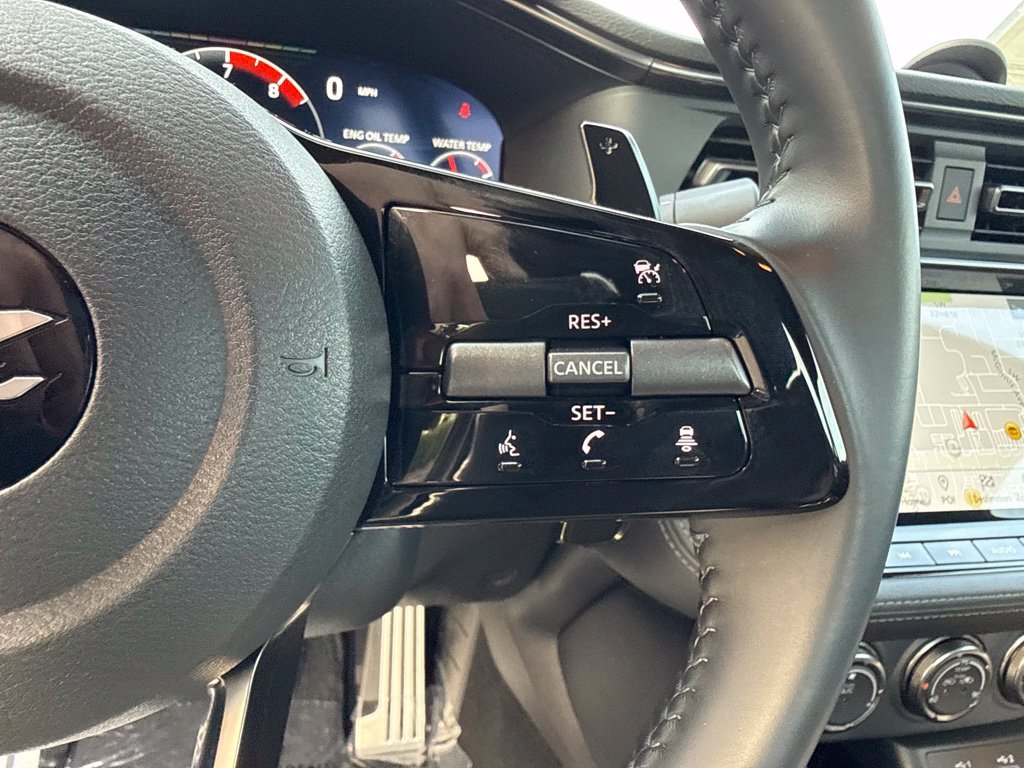 Used 2024 Black Diamond Pearl Nissan Performance image 12