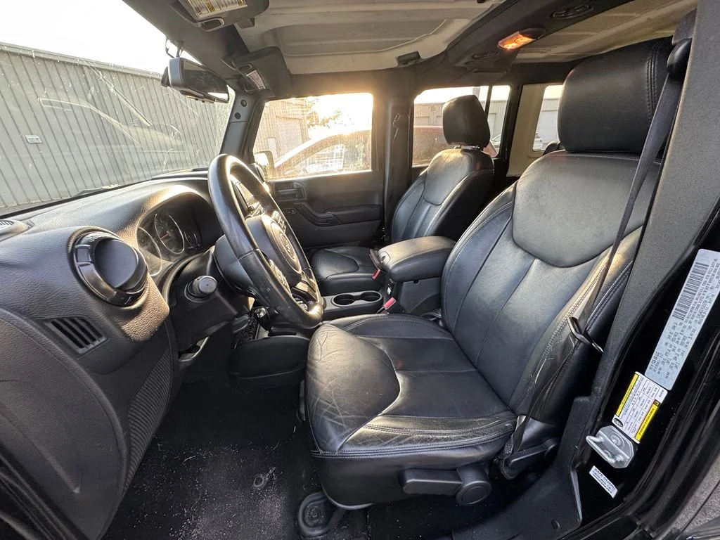 Used 2017 Black Jeep Unlimited Sahara image 9