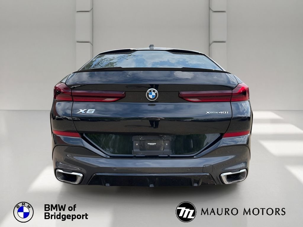 Certified Used 2024 Black BMW xDrive40i image 4
