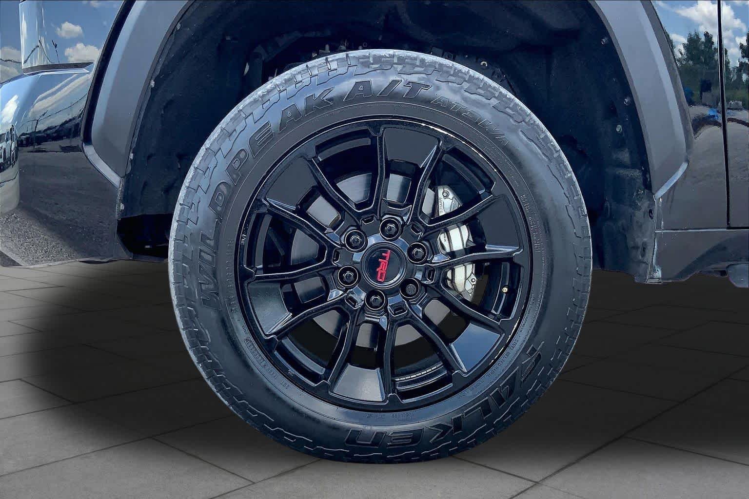Used 2023 Midnight Black Metallic Toyota SR5 image 11