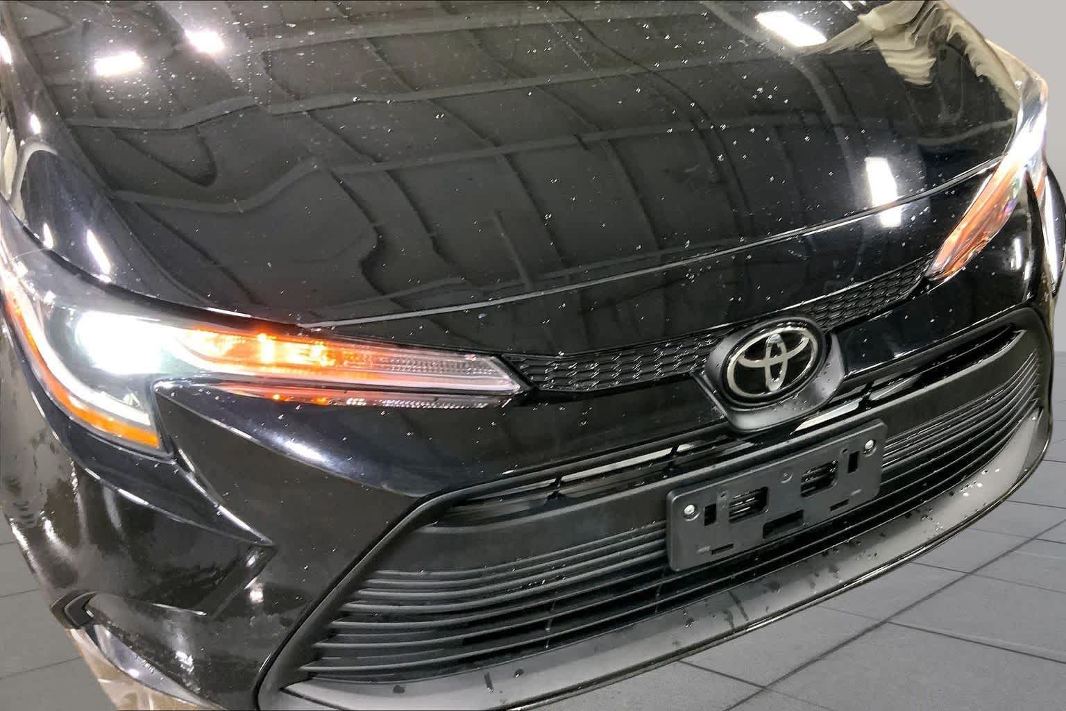 Used 2024 Midnight Black Metallic Toyota LE image 30