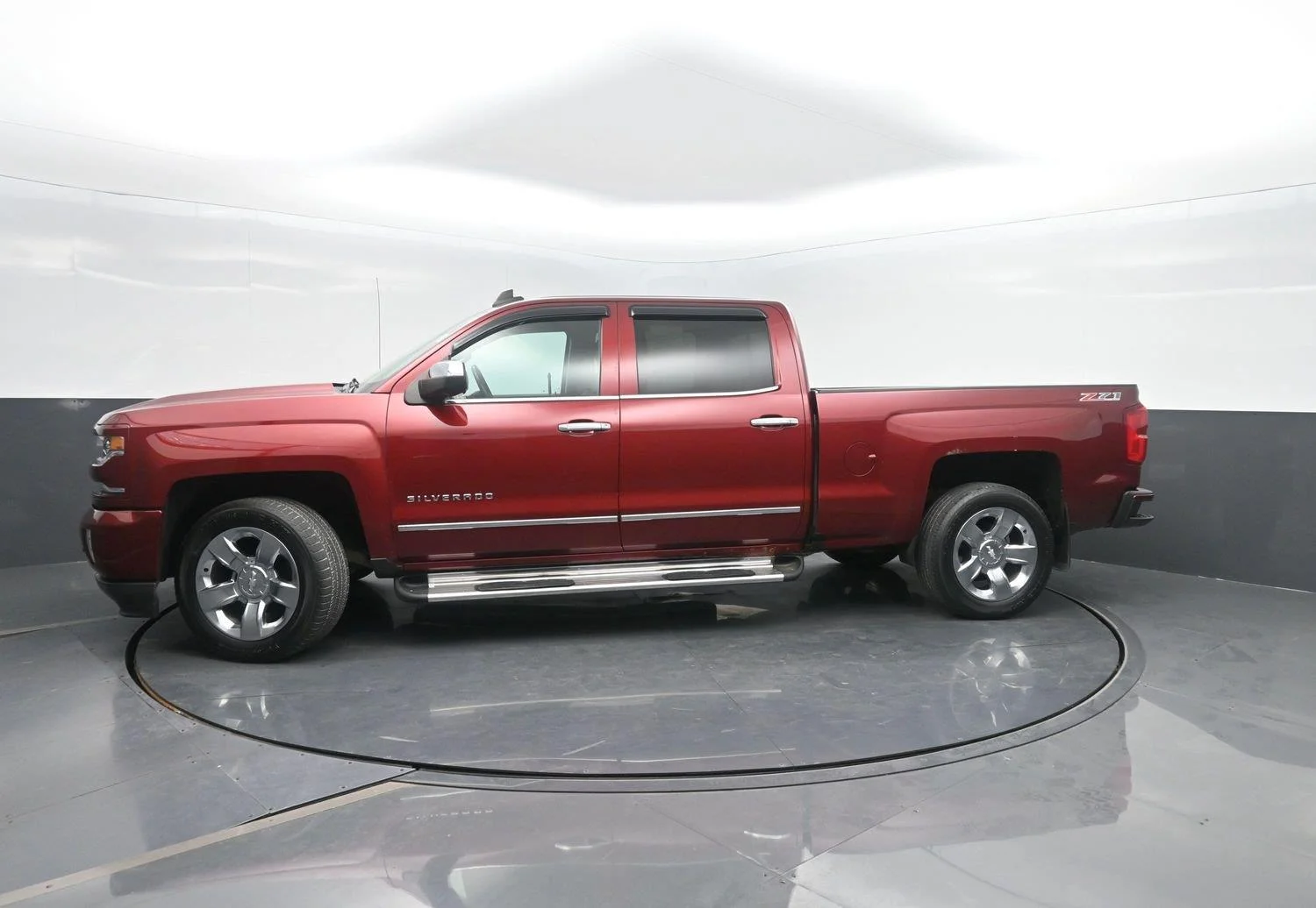 Used 2017 Siren Red Tintcoat Chevrolet LTZ image 1