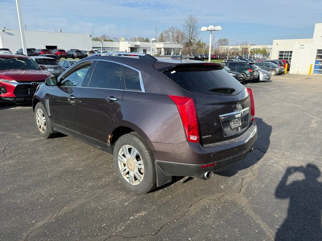 Used 2015 Cadillac SRX Luxury Collection with VIN 3GYFNBE34FS566765 for sale in Brighton, MI