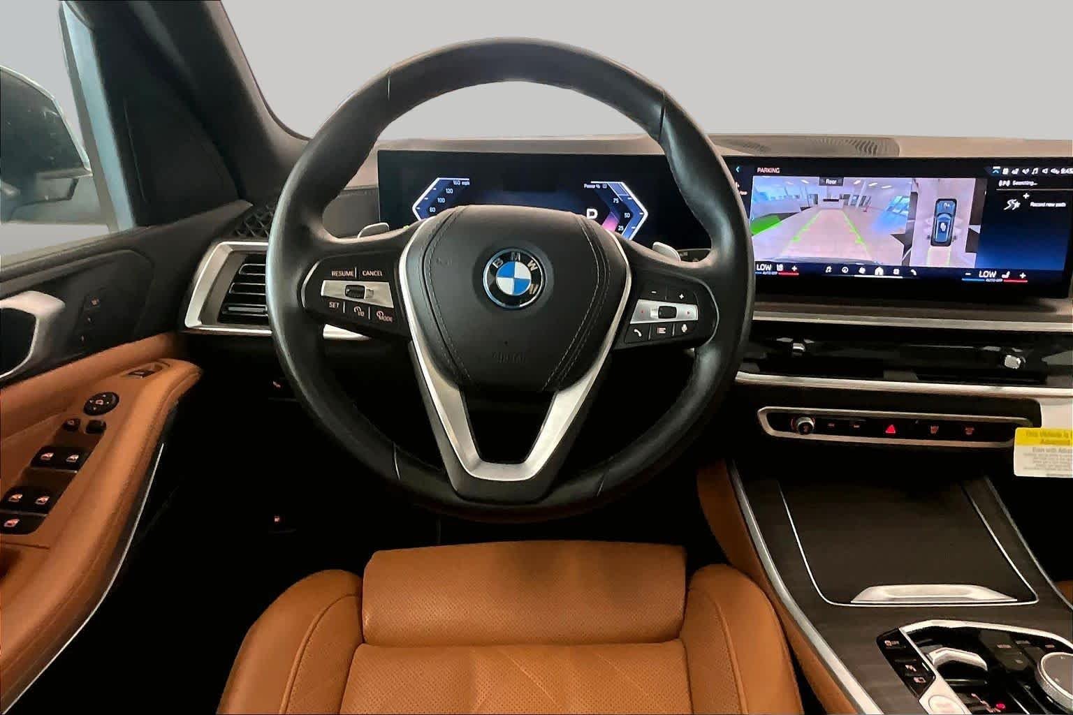 Used 2024 Blue Ridge Mountain Metallic BMW xDrive50e image 5