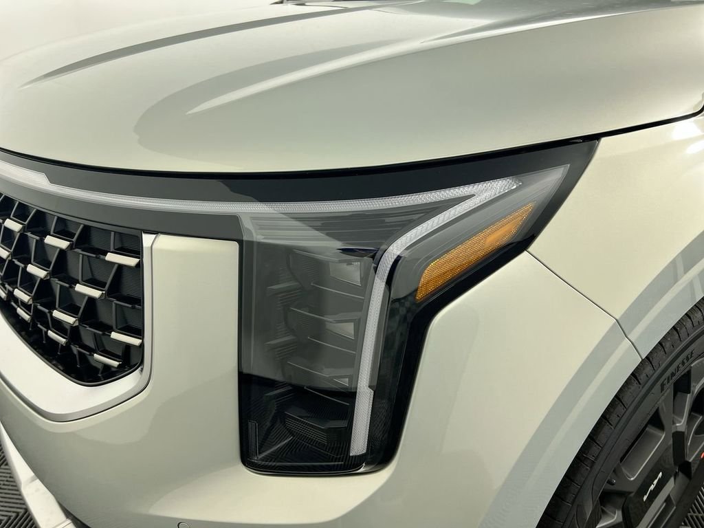 New 2026 Ivory Silver Kia EX image 11
