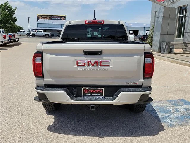 Used 2026 Tan GMC AT4 4x4 Crew Cab 5 ft. box 131 in. WB image 4