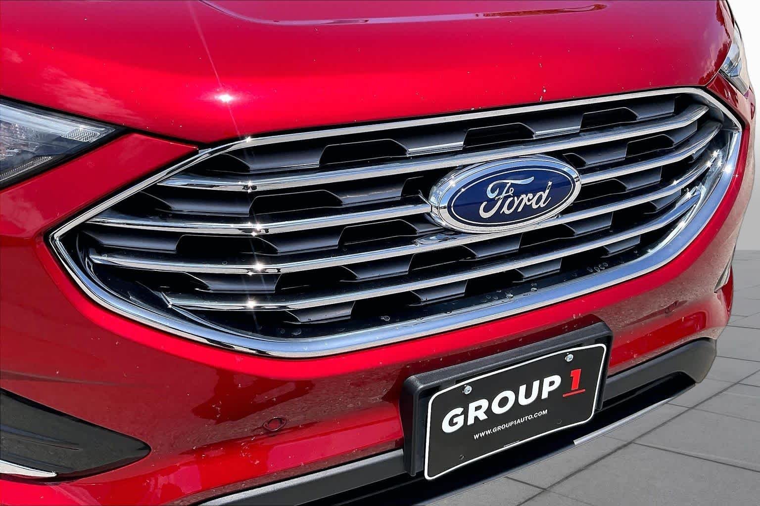 Used 2023 Rapid Red Metallic Tinted Clearcoat Ford Titanium image 30