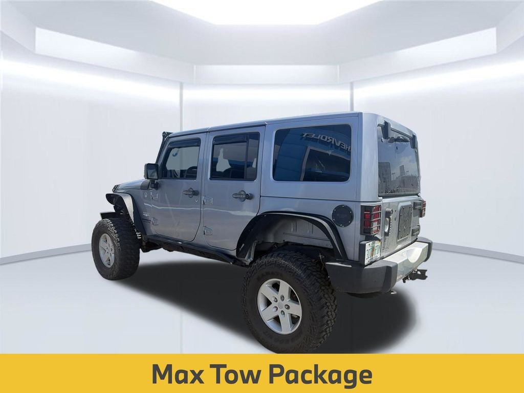 Used 2014 Billet Metallic Clearcoat Jeep Unlimited Sahara image 6