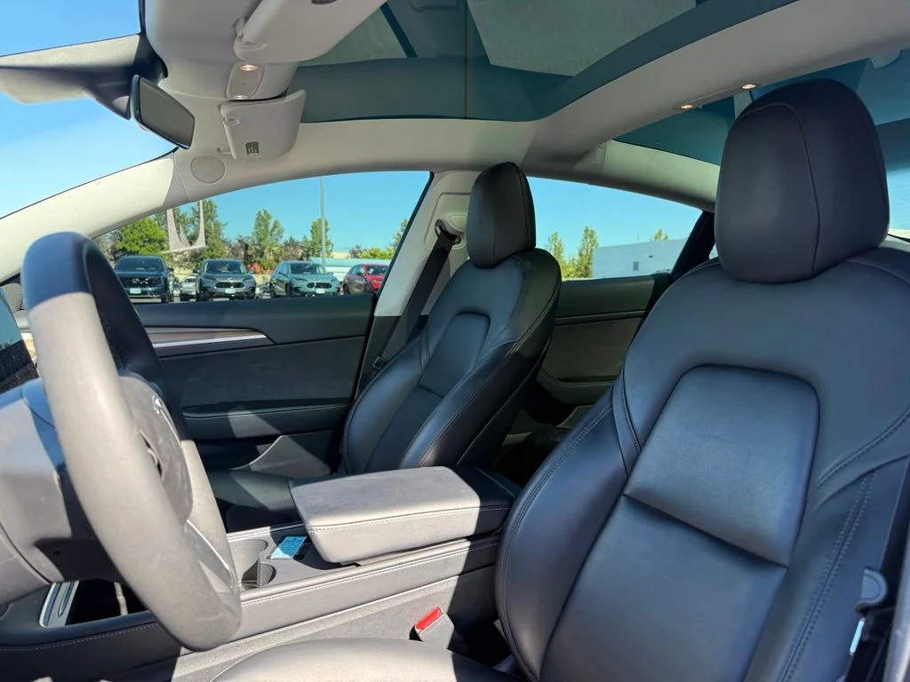 Used 2021 Solid Black Tesla Standard Range Plus image 9