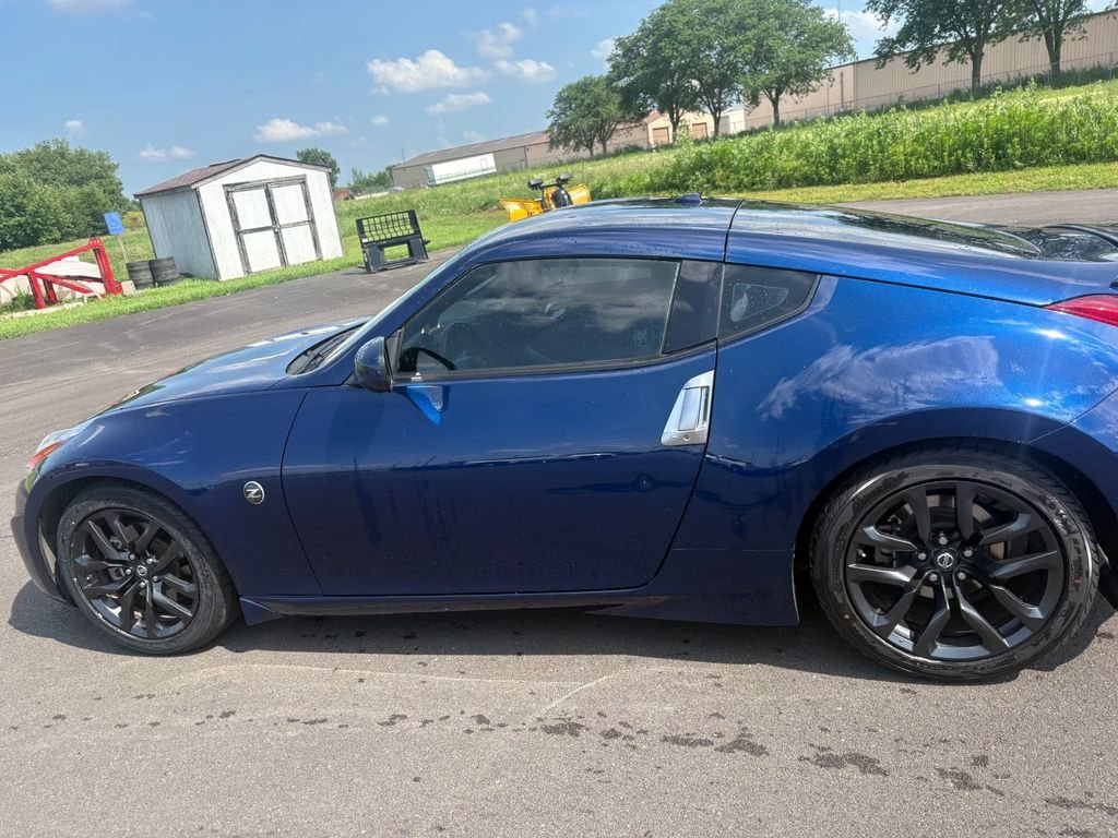 Used 2016 Deep Blue Pearl Nissan Touring image 2