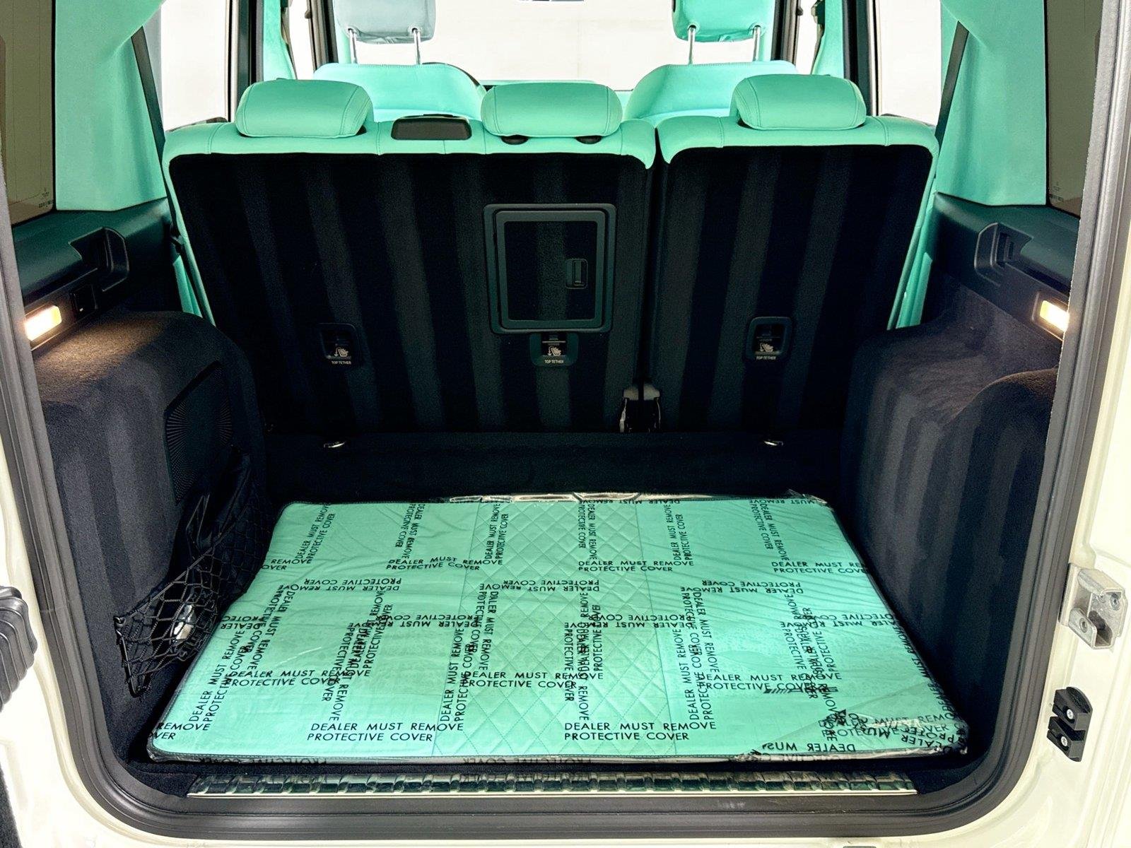 Used 2024 Polar White Mercedes-Benz AMG® G 63  Brabus Custom Widebody / Custom Tiffany Interior image 24