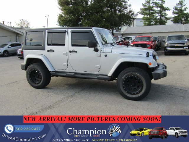 Used 2012 Silver Jeep Unlimited Sahara image 3