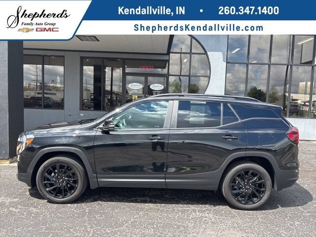 Used 2024 Ebony Twilight Metallic GMC SLE image 1