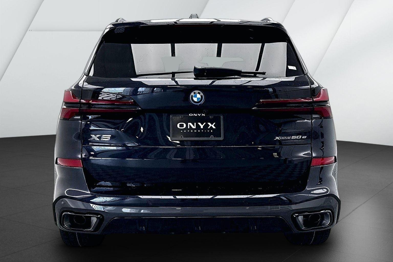 New 2026 Carbon Black Metallic BMW xDrive50e image 7