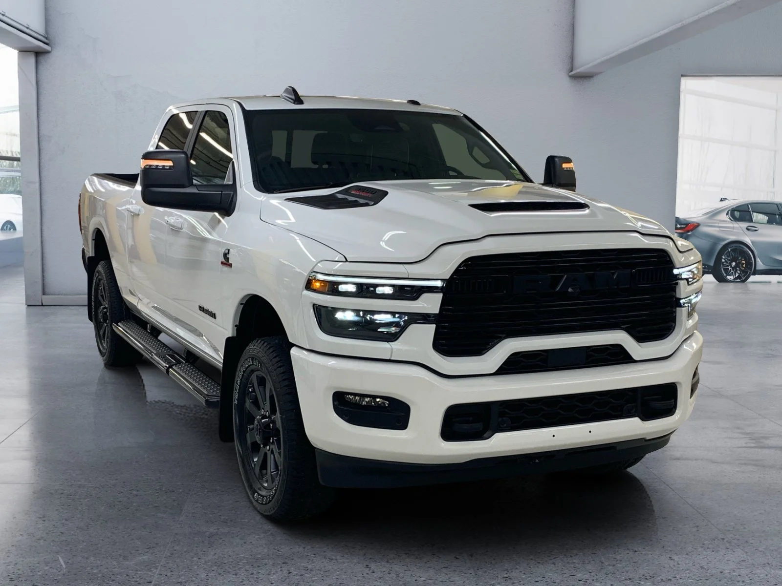New 2026 Bright White Ram Laramie image 7