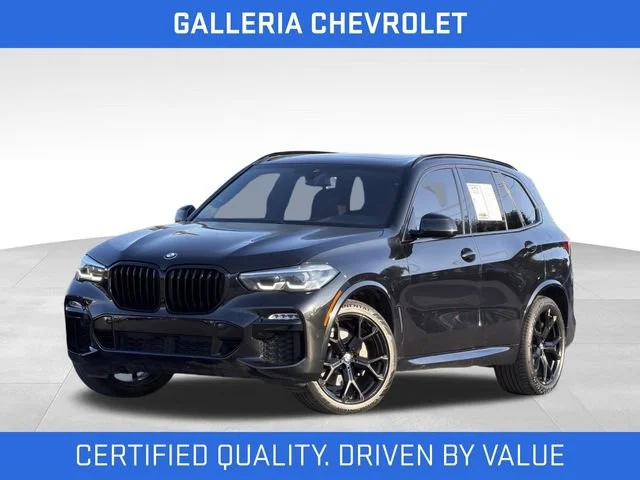 Used 2021 Black BMW xDrive40i image 1