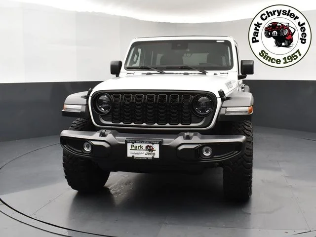Used 2025 Jeep Wrangler 4-Door Willys with VIN 1C4PJXDN4SW510524 for sale in Burnsville, Minnesota