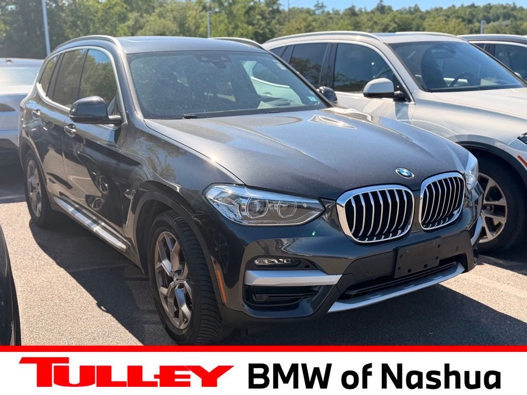 Used 2021 Dark Graphite Metallic BMW xDrive30i image 1