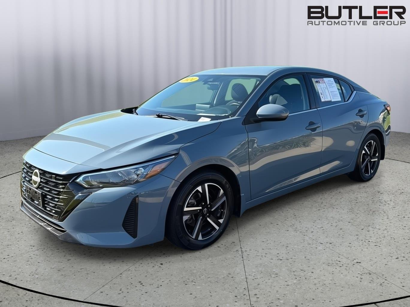 Used 2024 Atlantic Gray Metallic Nissan SV image 1