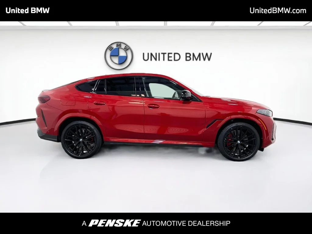 New 2026 Melbourne Red Metallic BMW M60i image 4