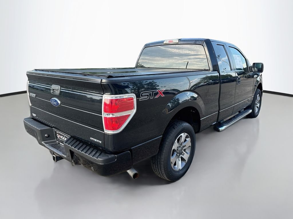 Used 2014 TUXEDO BLACK METALLIC Ford STX image 7