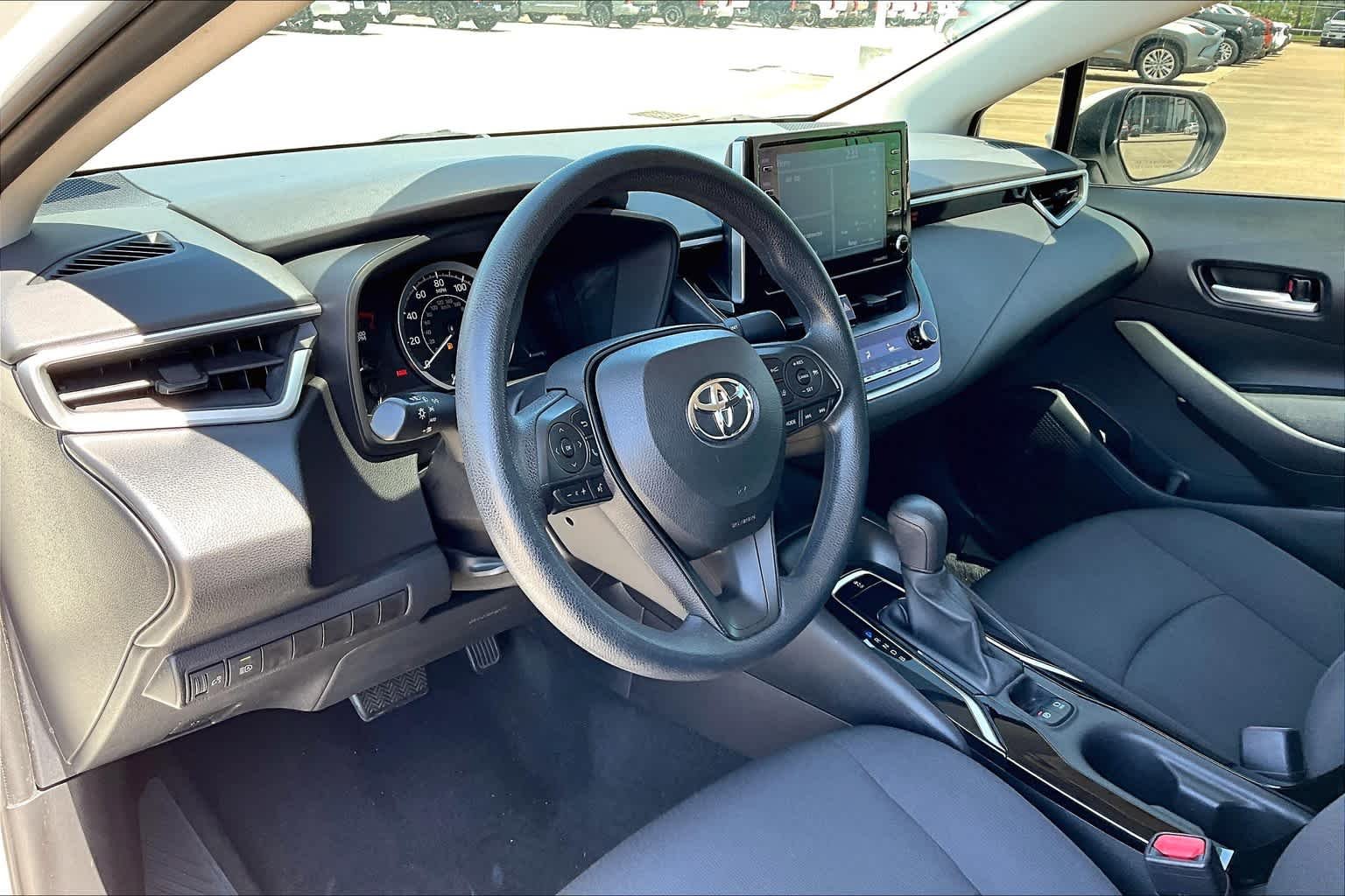 Used 2021 Super White Toyota LE image 18