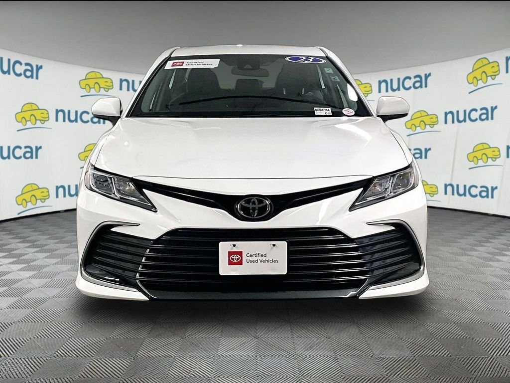 Used 2023 White Toyota LE image 2