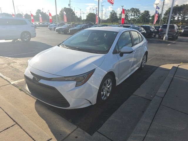 Used 2025 White Toyota LE image 1
