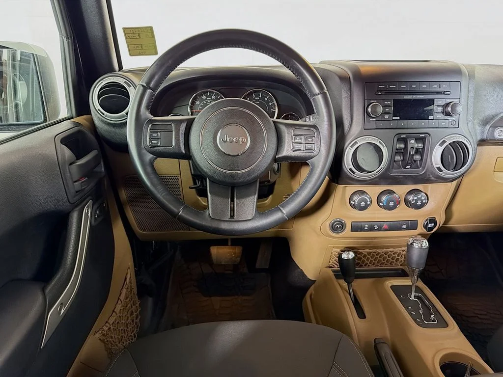 Used 2015 Black Jeep Unlimited Sahara image 19