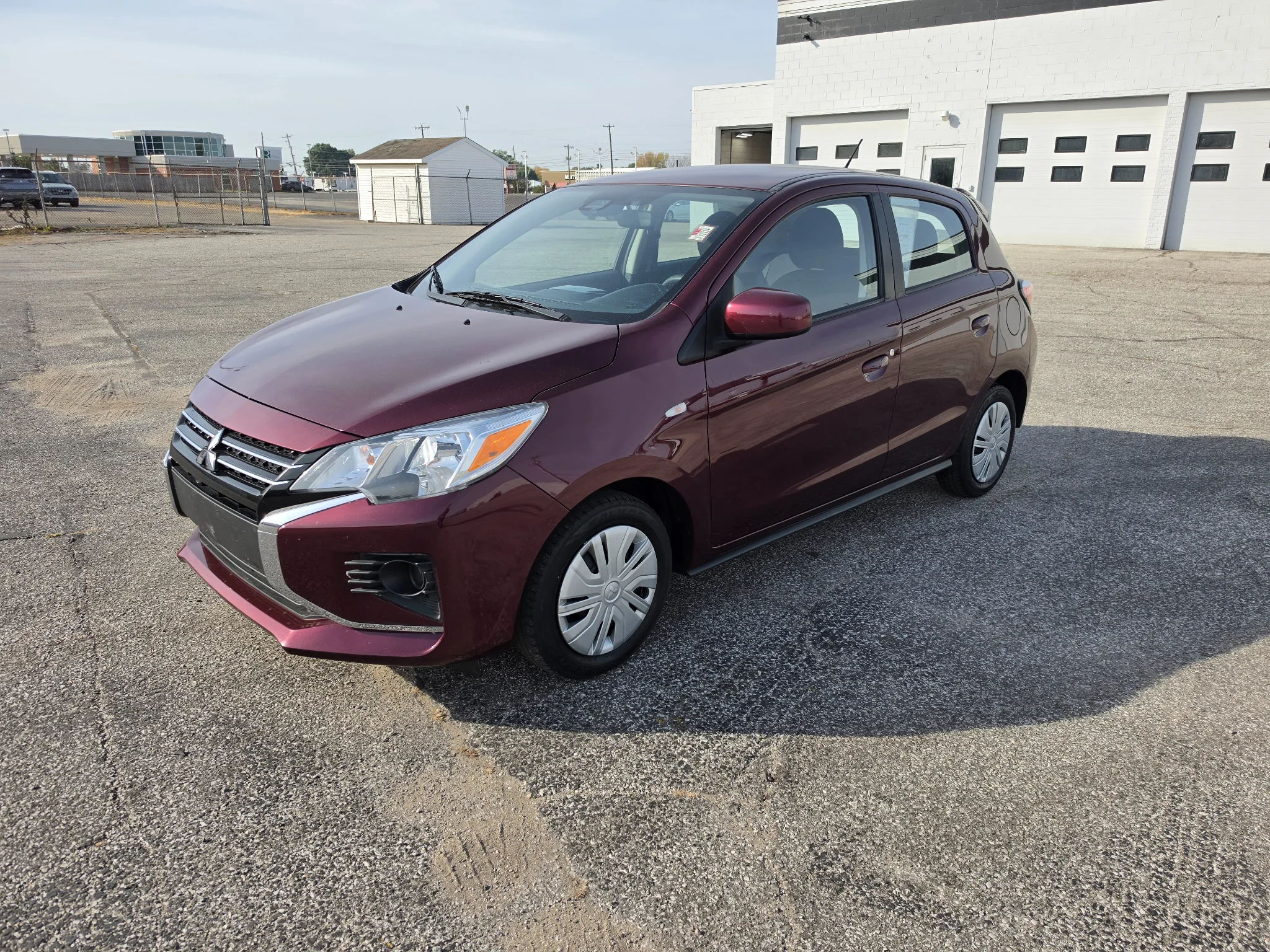 Used 2024 Wine Red Metallic Mitsubishi ES image 1