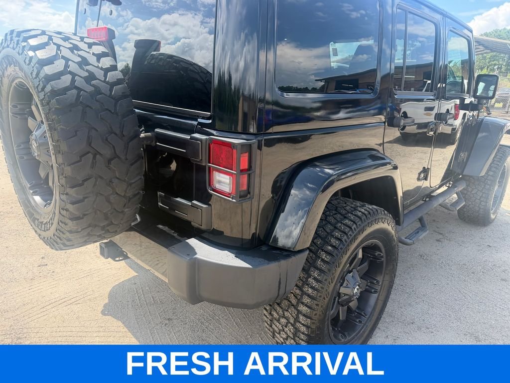 Used 2015 Black Jeep Unlimited Sahara Altitude image 3