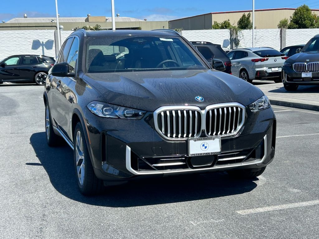 New 2026 Black Sapphire Metallic BMW xDrive50e image 7
