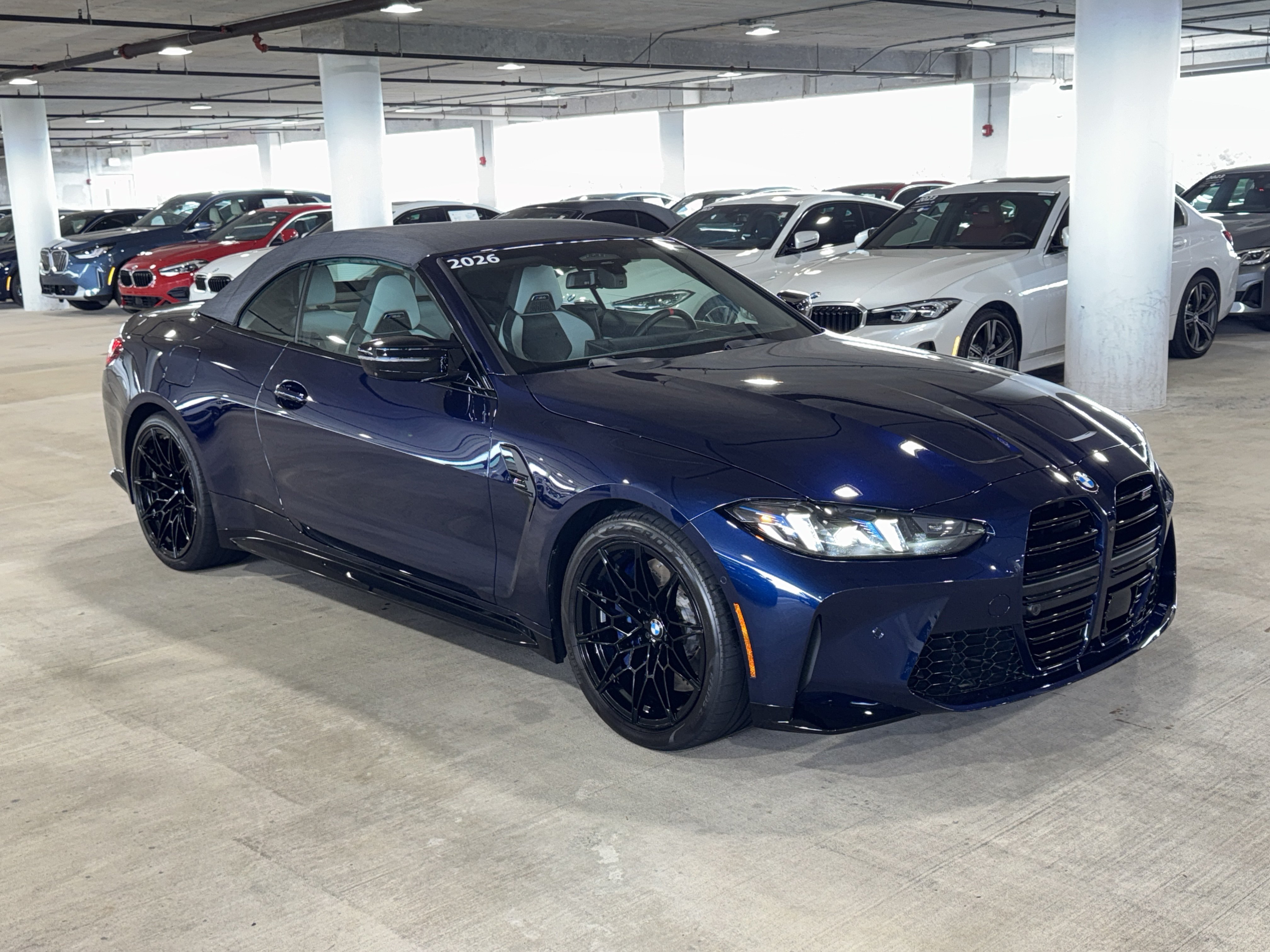 Used 2026 Tanzanite Blue II Metallic BMW Competition xDrive image 2