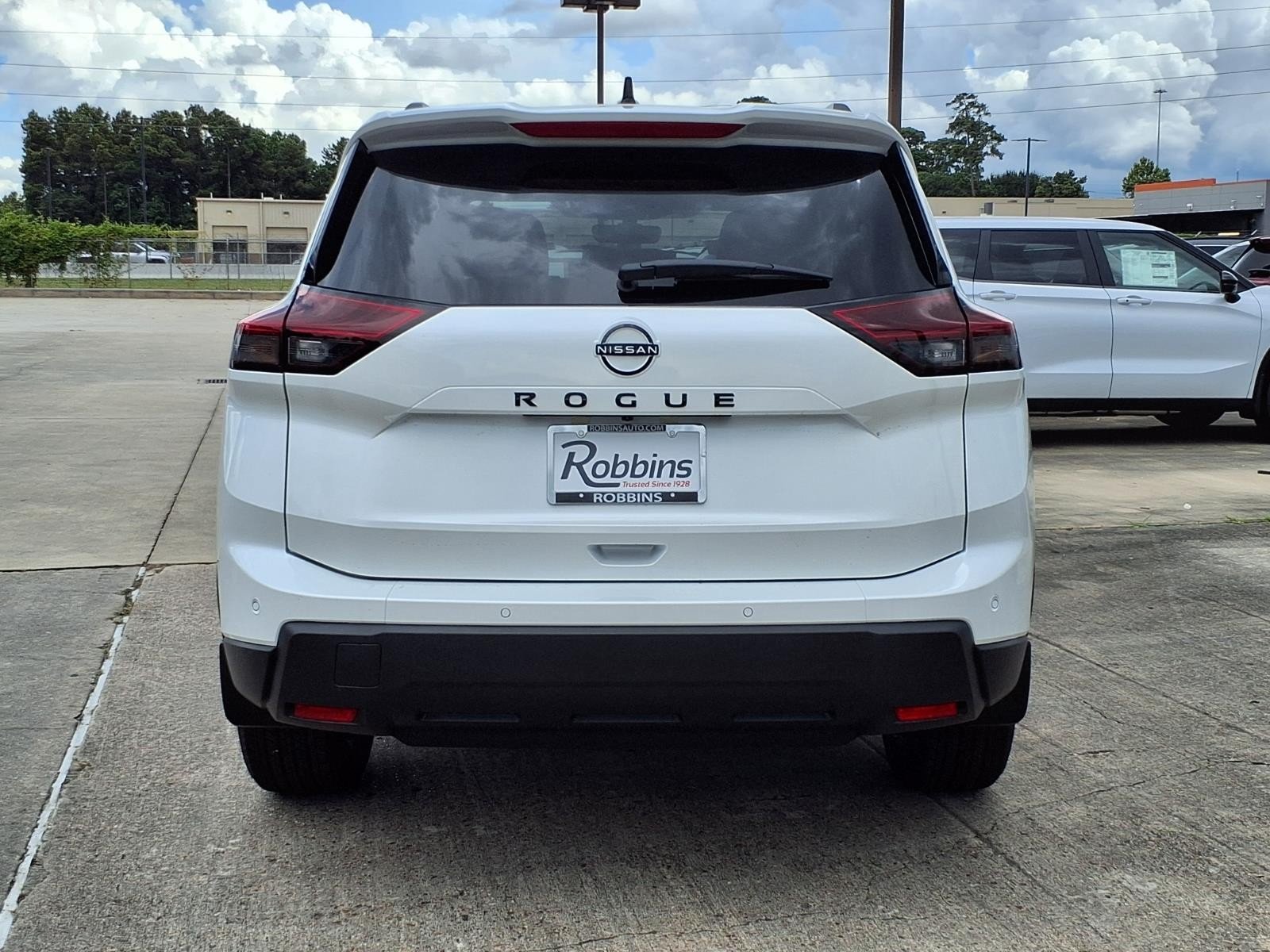2026 Nissan Rogue Dark Armor™ White at Robbins Nissan