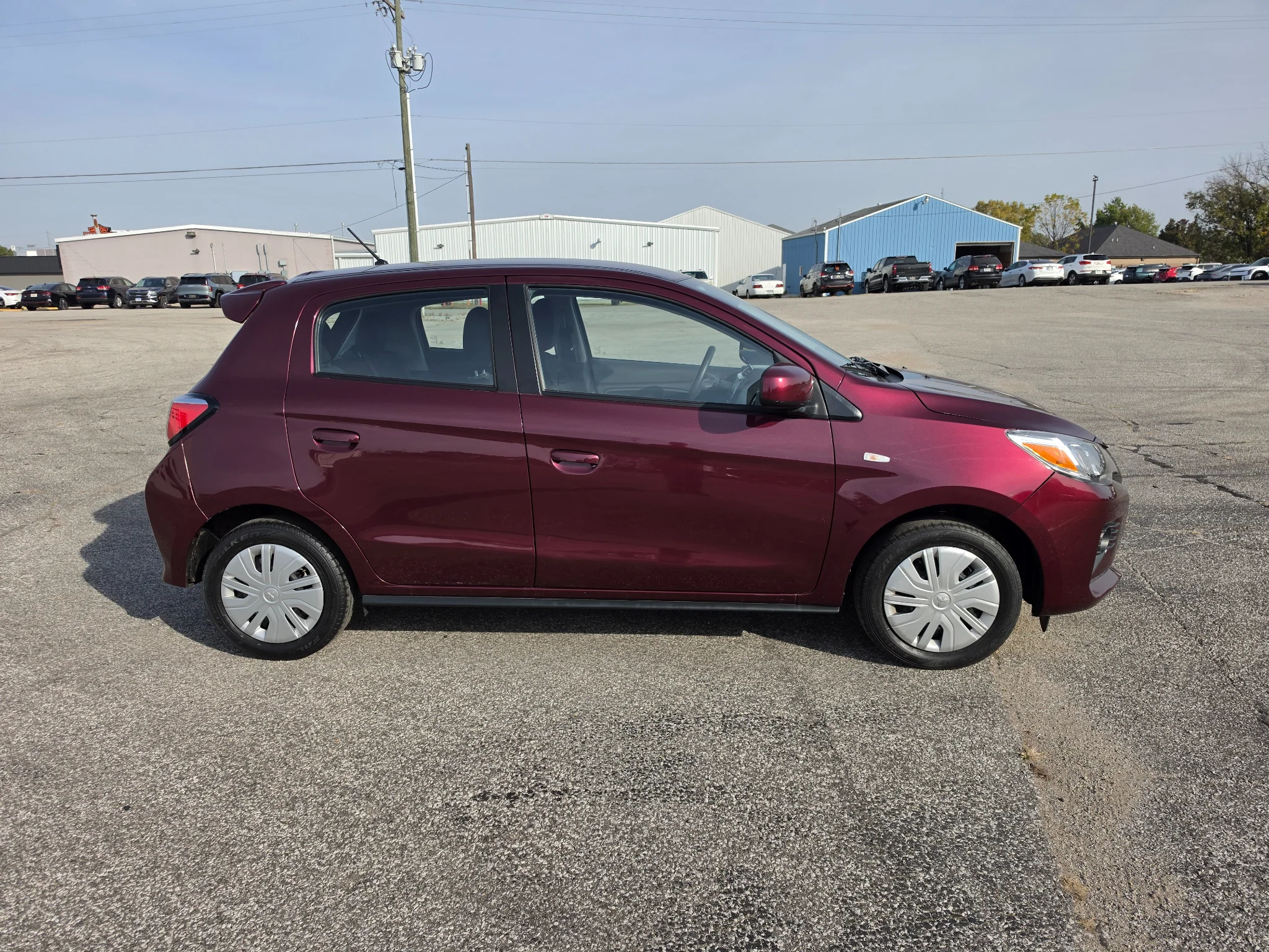 Used 2024 Wine Red Metallic Mitsubishi ES image 7