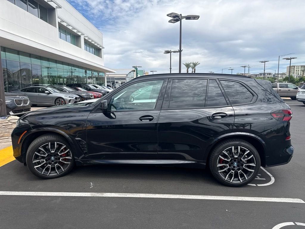 Certified Used 2024 Black Sapphire Metallic BMW xDrive50e image 3